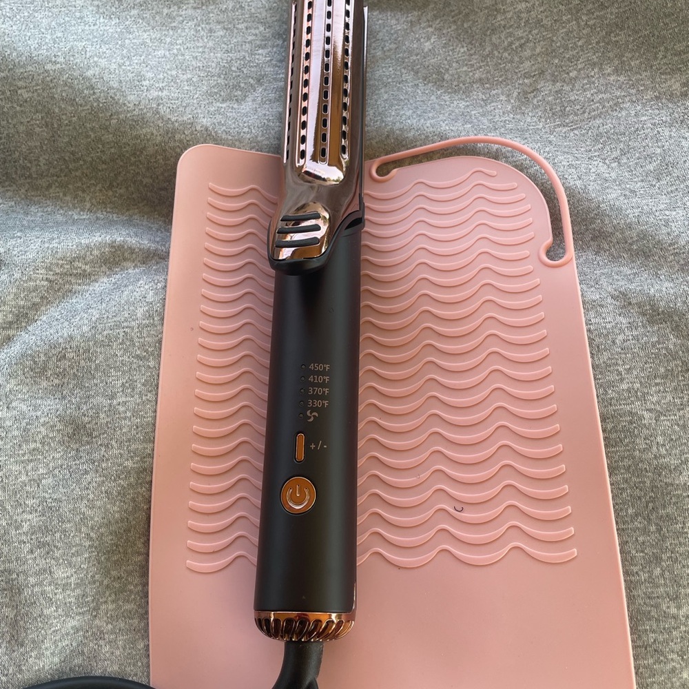 Sleek Black Hair Styling Tool with Rose Gold Accents